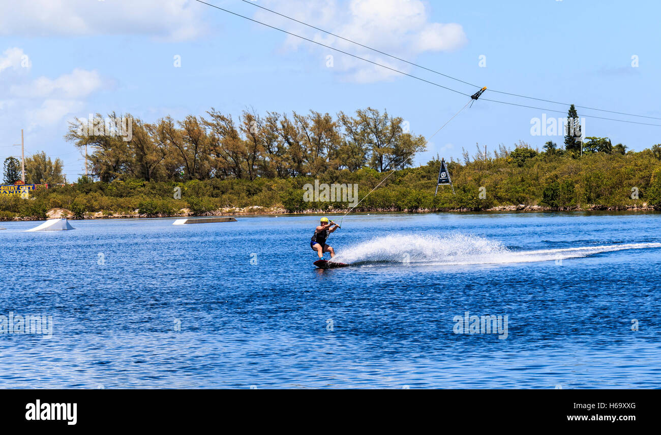 Kiteboarding and wakeboarding by cable at Keys Cable Park on Grassy Key in the Florida Keys. Stock Photo