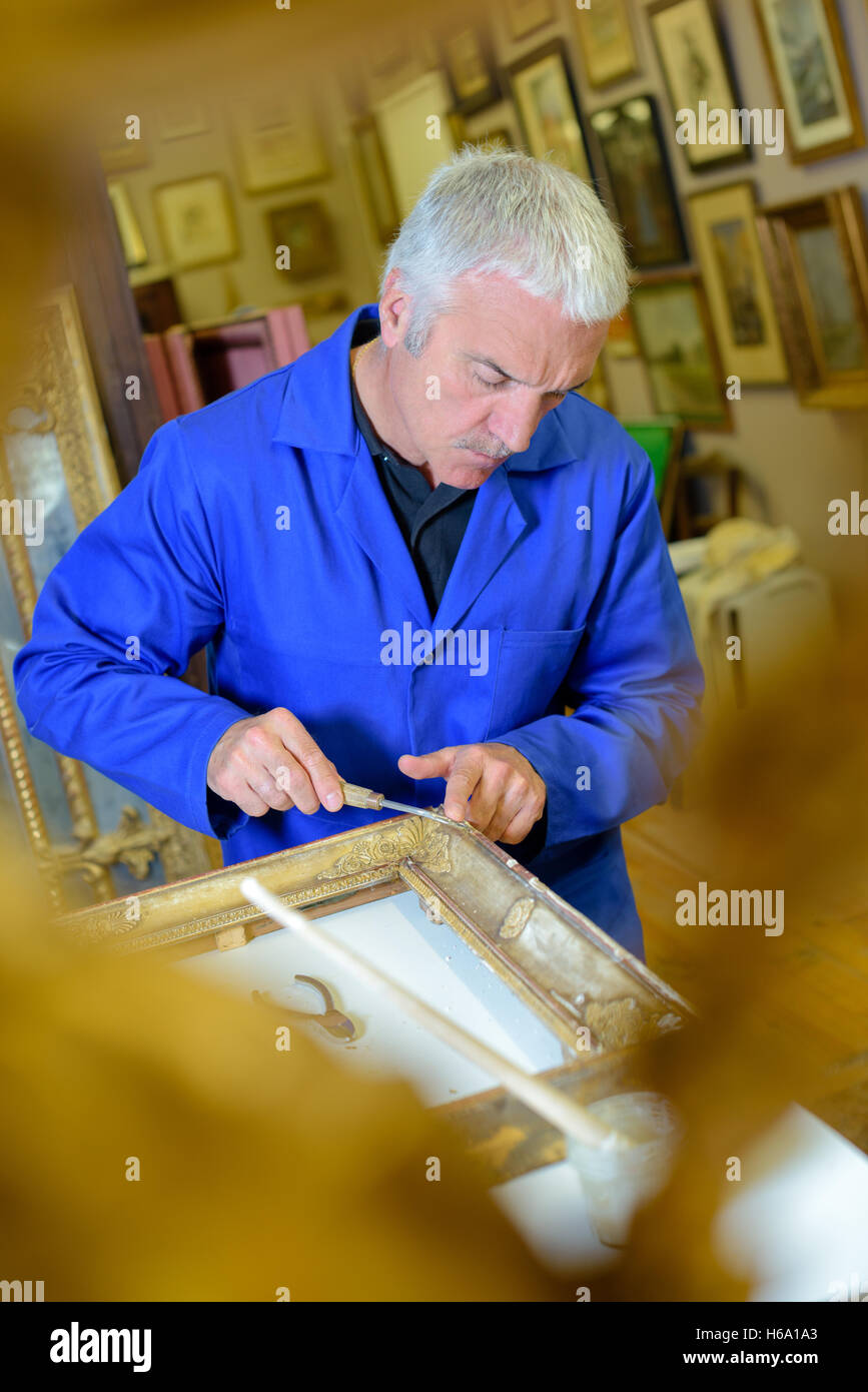 artist making a frame Stock Photo Alamy