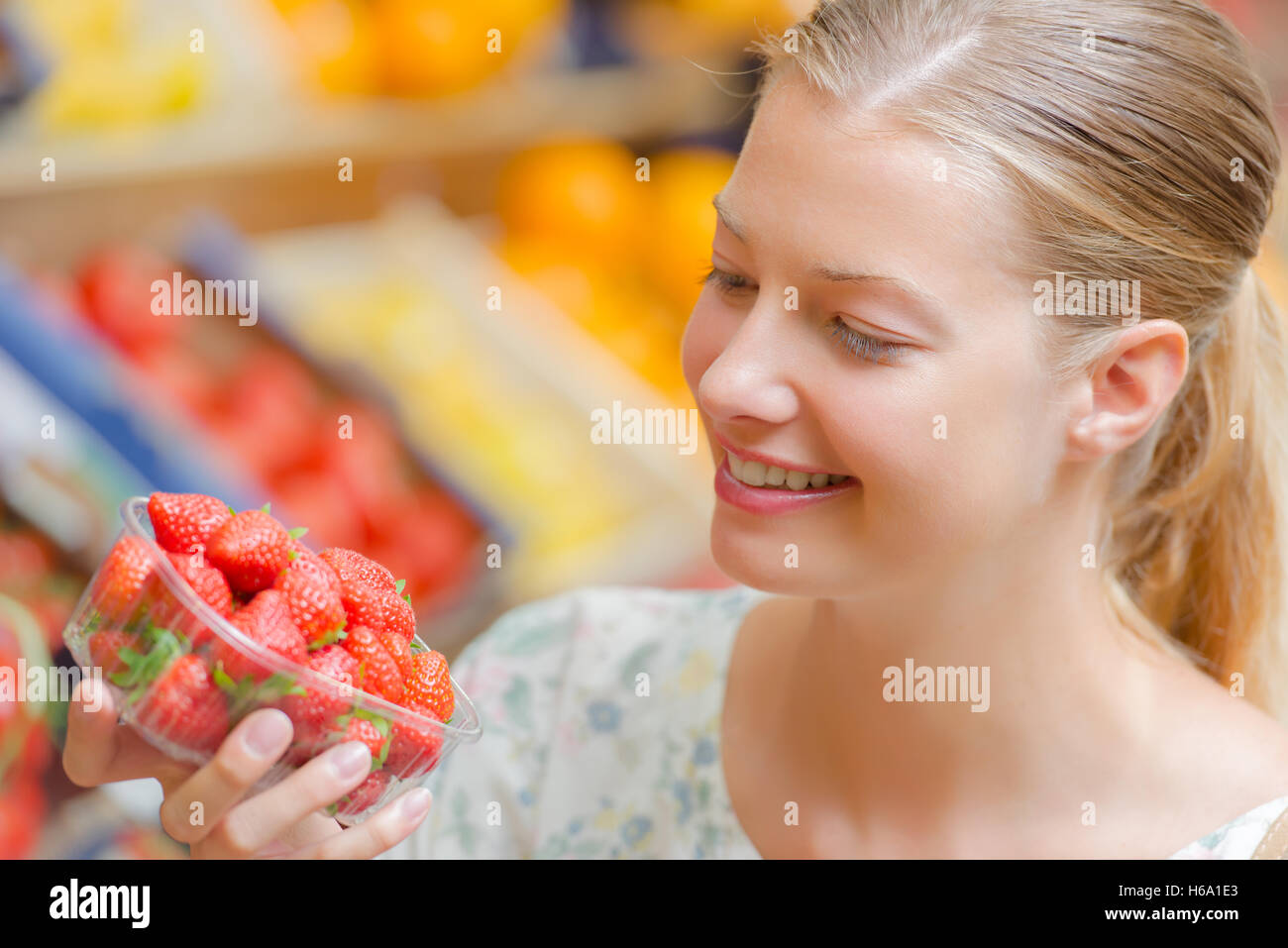 girl with strawberry Stock Photo Alamy
