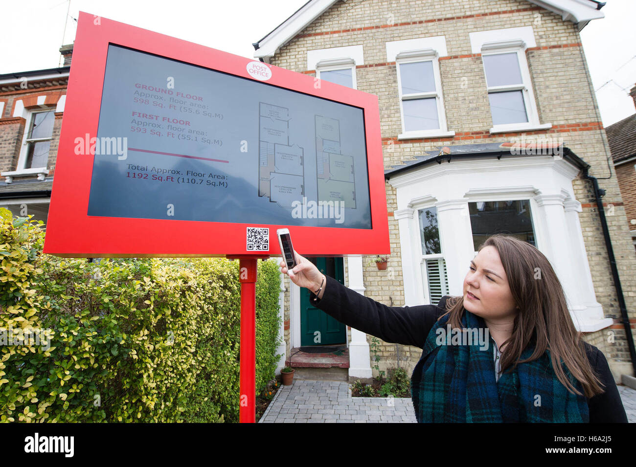 Hayley from London demonstrates a prototype 'digital forsale sign