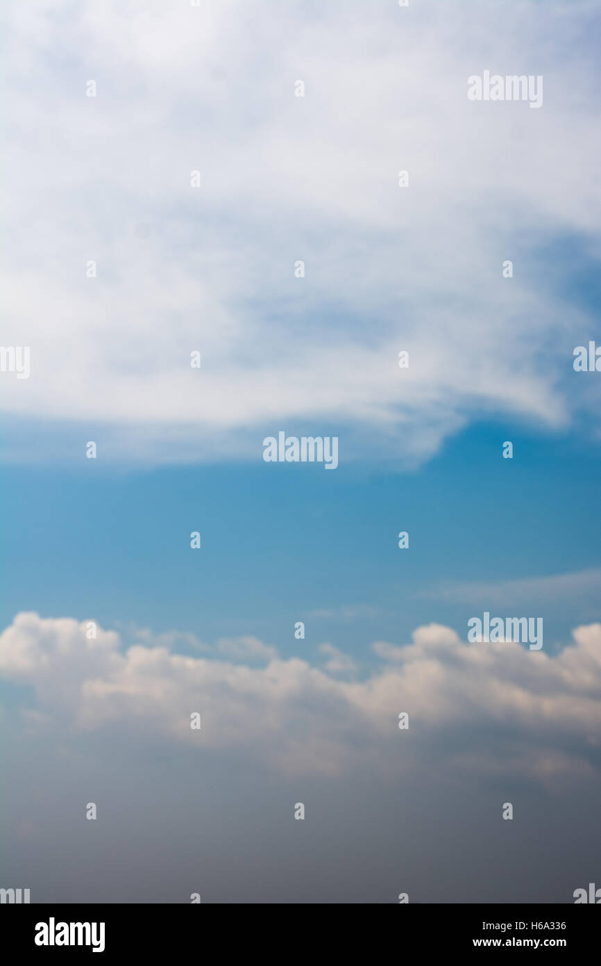 Blue cloudy sky with white and grey clouds Stock Photo - Alamy