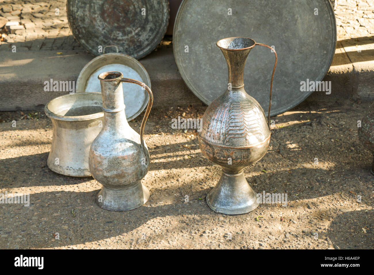 Selling old metal cookware in bazaar Stock Photo Alamy