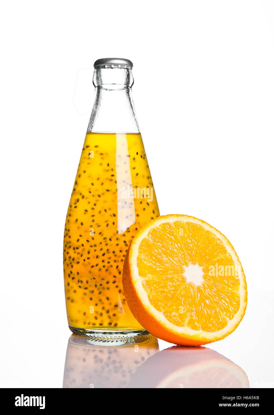 Bottle of exotic healthy juice with orange on white background Stock Photo Alamy