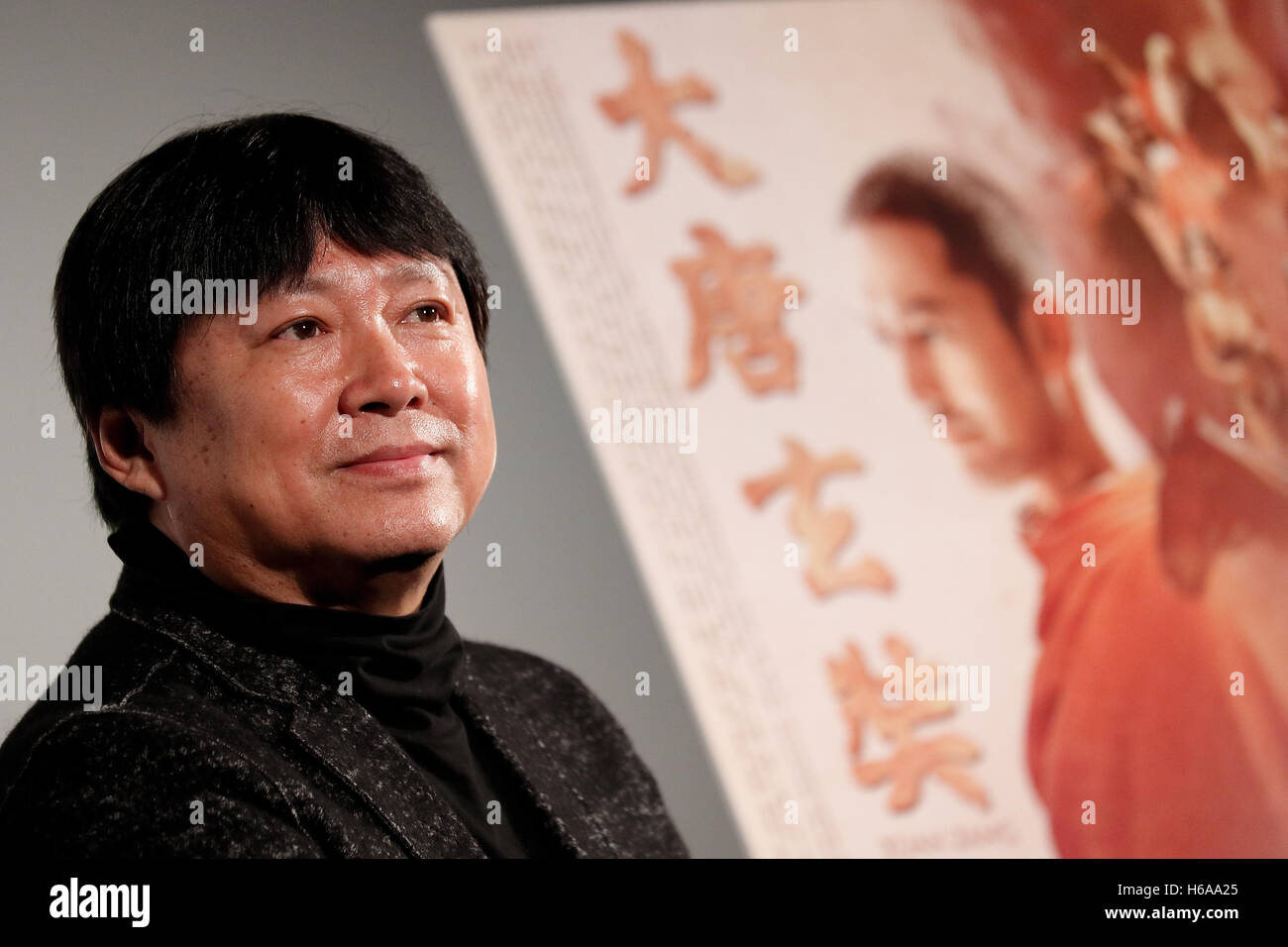 Chinese director Huo Jianqi attends a stage greeting for the movie Xuan