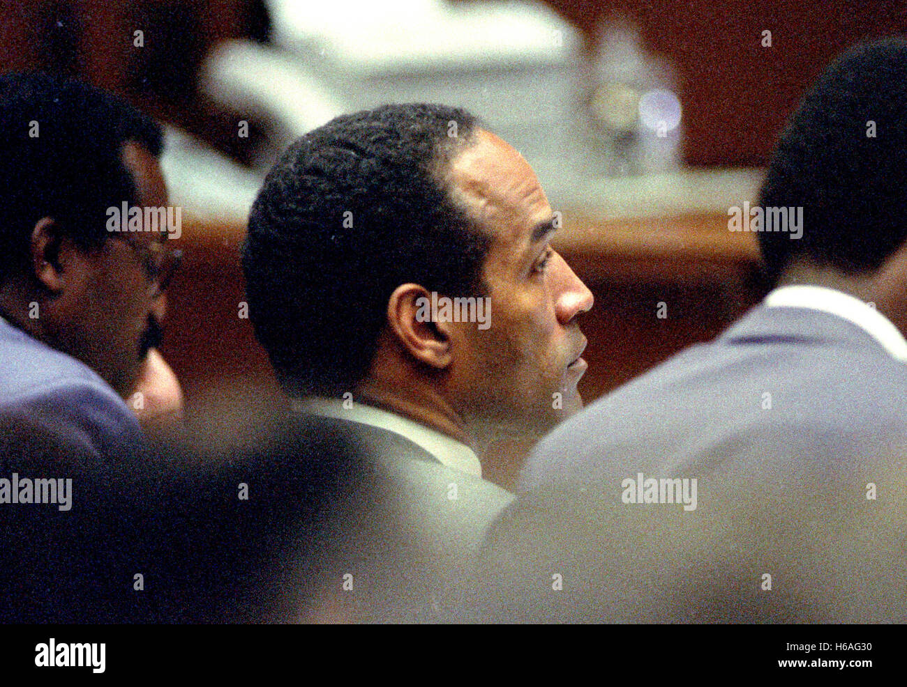 Former NFL star running back O.J. Simpson looks on during his trial of for the murder of his former wife, Nicole Brown Simpson and a friend of hers, restaurant waiter, Ron Goldman in Los Angeles County Superior Court in Los Angeles, California on July 13, 1995. Credit: Steve Grayson/Pool via CNP - NO WIRE SERVICE - Stock Photo