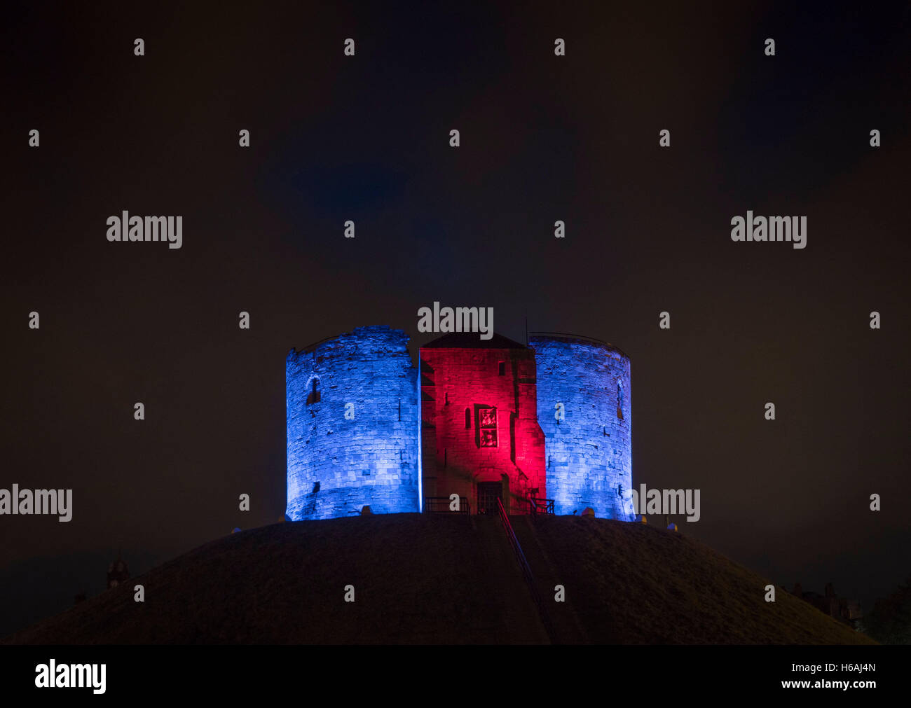 York, UK. 26th October, 2016. First night of the Illuminating York Festival which sees iconic buildings transformed using light painting and installations from international artists. Photo shows the iconic Cliffords Tower bathed in light by LumenPulse. The festival runs until Saturday October 29th. Photo Bailey-Cooper Photography/Alamy Live News Stock Photo