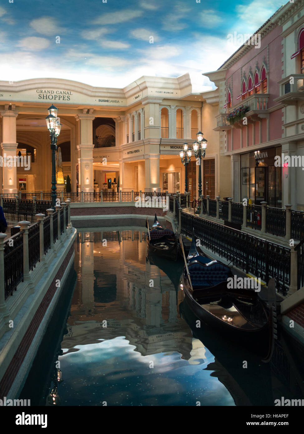 The Venetian interior by the canal at night Stock Photo
