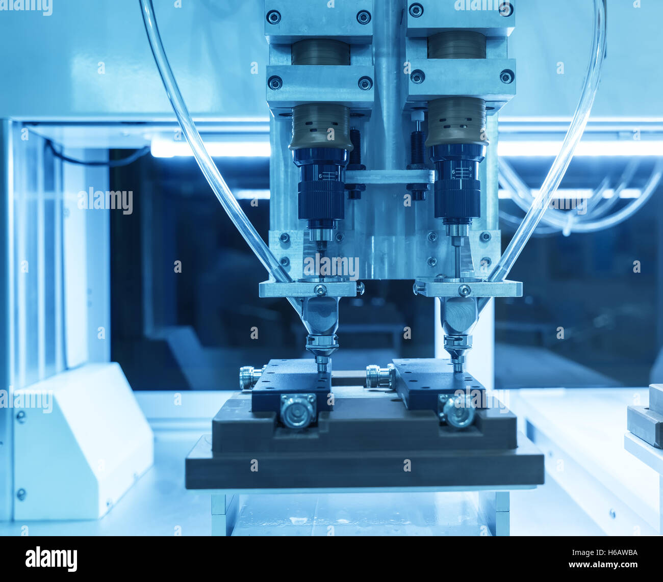 robotic arm machine tool at industrial manufacture factory Stock Photo