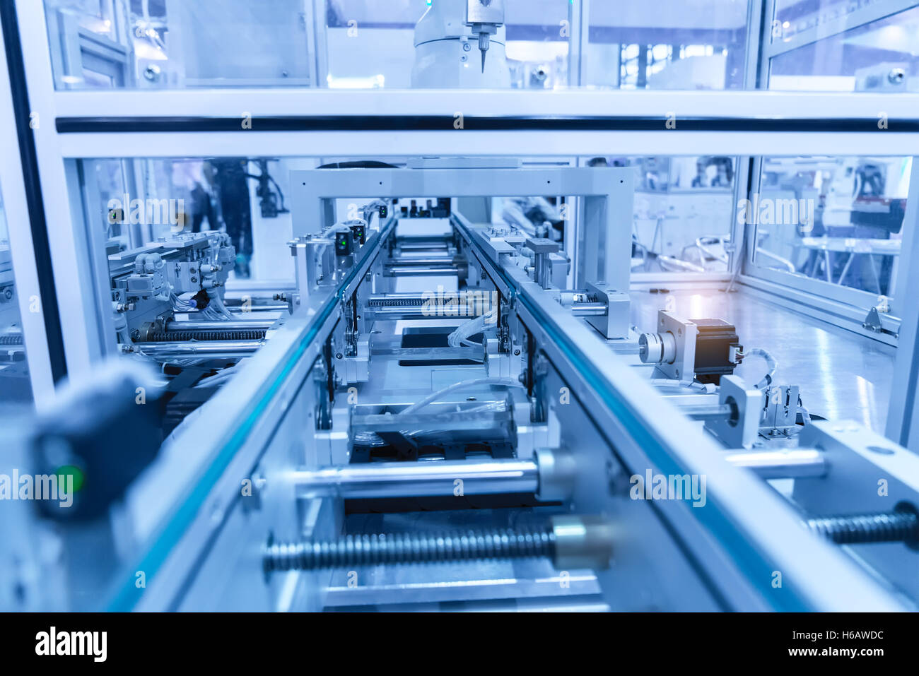 Robotic arm at production line in factory Stock Photo - Alamy