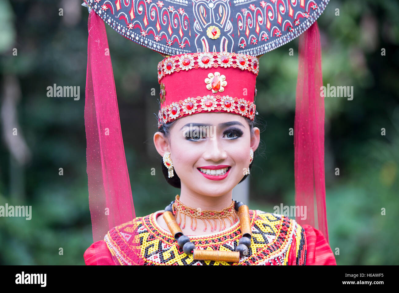 Toraja traditional dancer pose for camera with colourful traditional ...