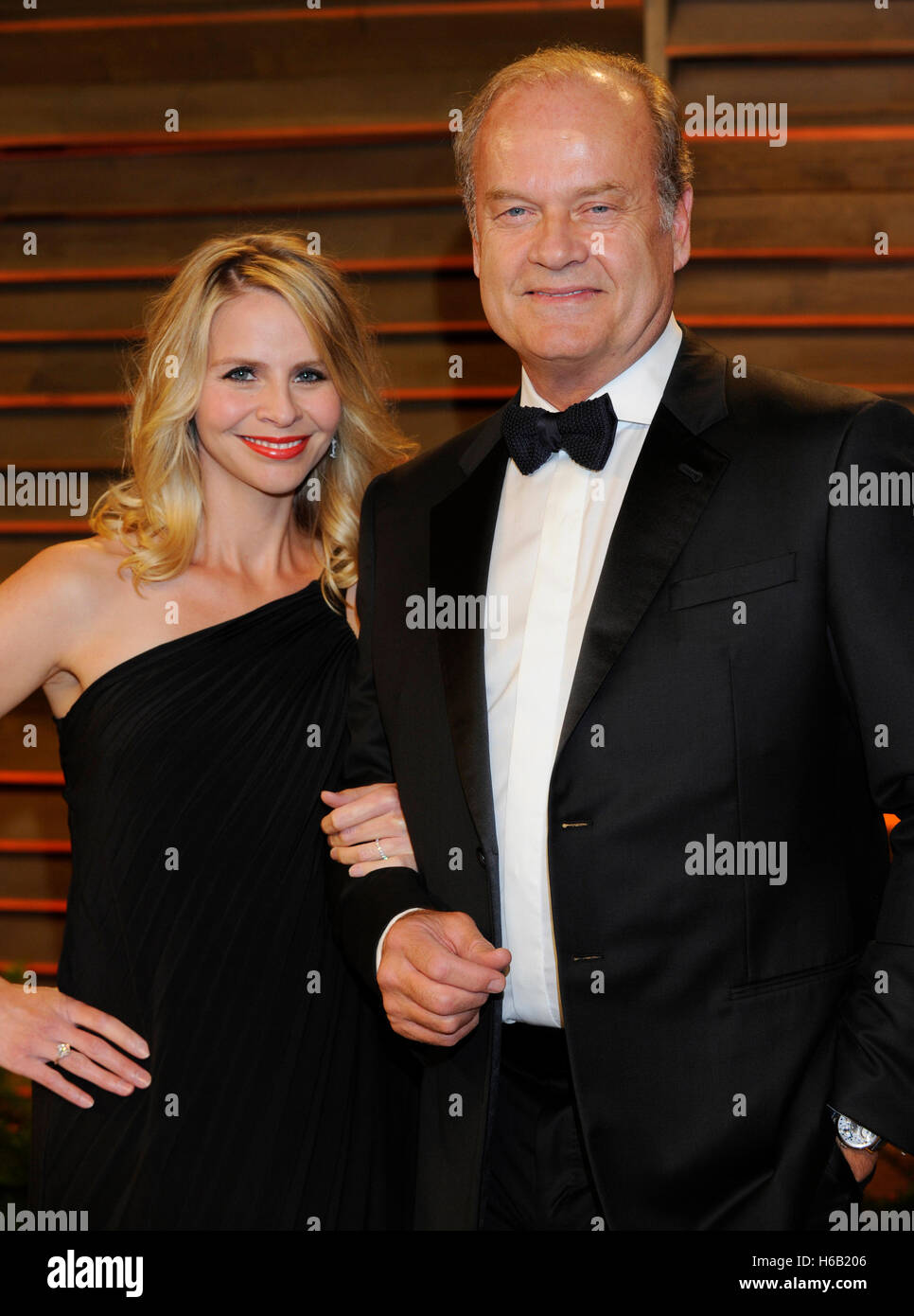 Actor Kelsey Grammer (R) and wife Kayte Walsh attends the 2014 Vanity Fair Oscar Party on March 2, 2014 in West Hollywood, California. Stock Photo