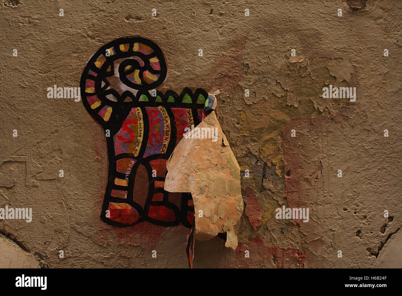 A decayed graffiti dog peeling off the wall Stock Photo Alamy