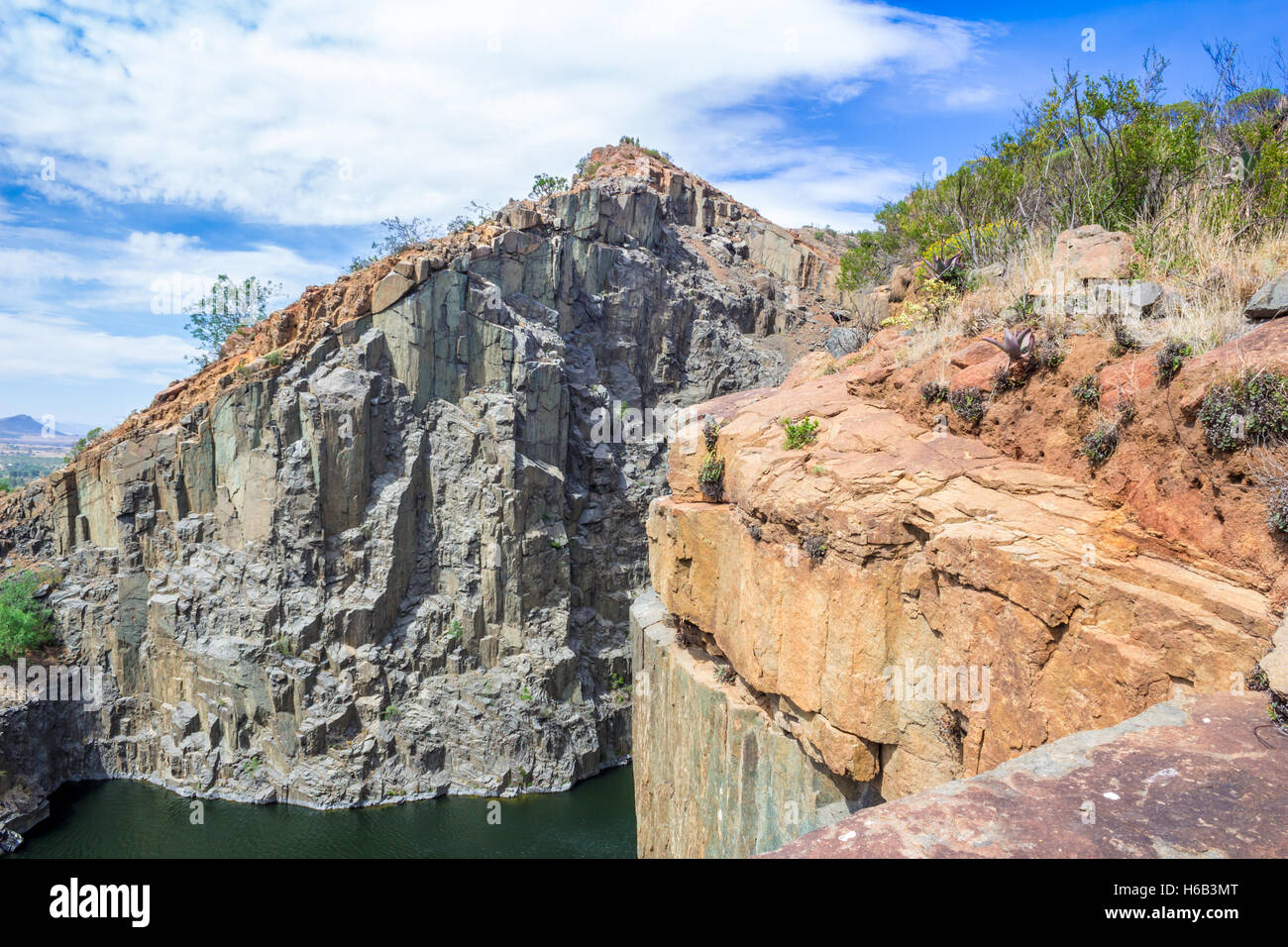 Disused old dolerite rock quarry Stock Photo Alamy