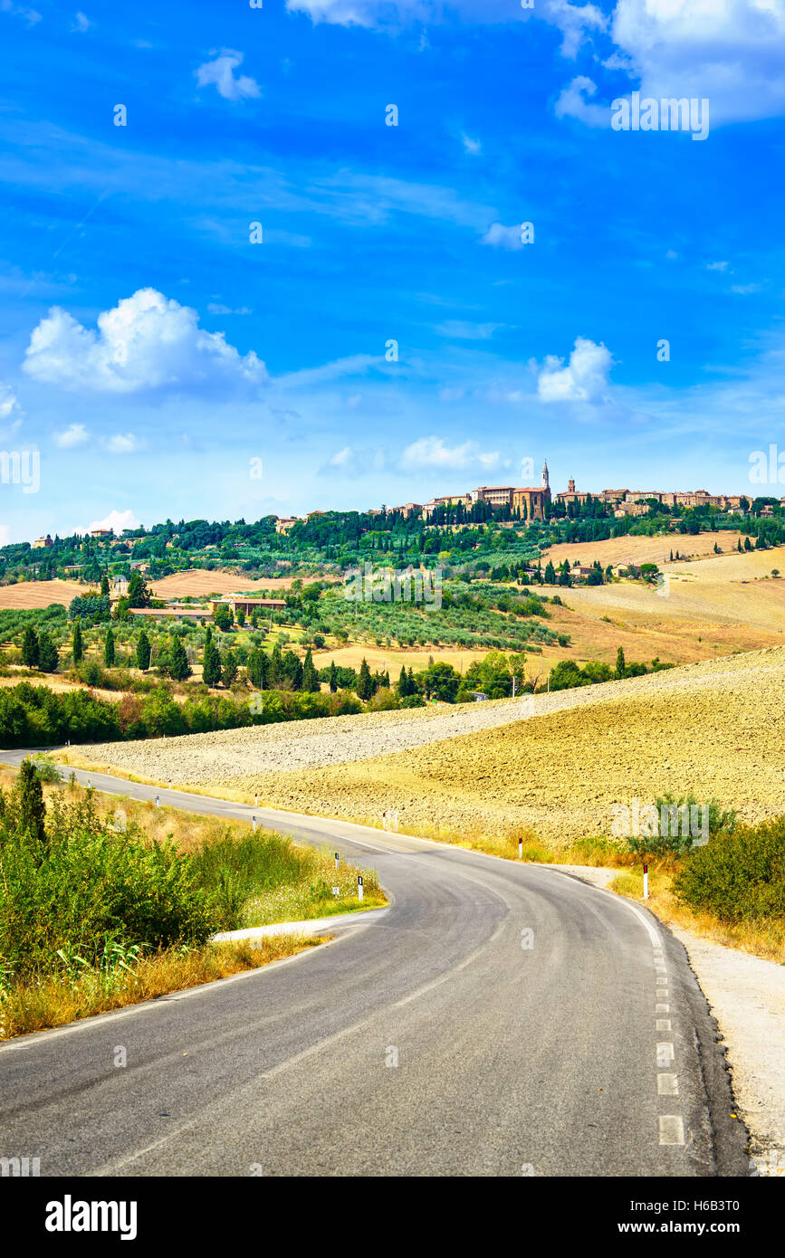 Tuscany, road to Pienza medieval village on background. Siena, Val d Orcia, Italy. Stock Photo