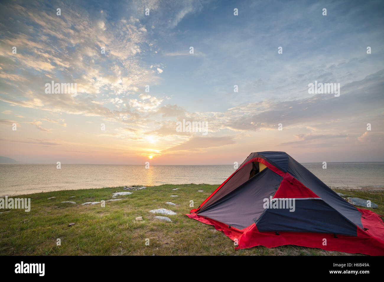 Tent on seashore in the morning Stock Photo