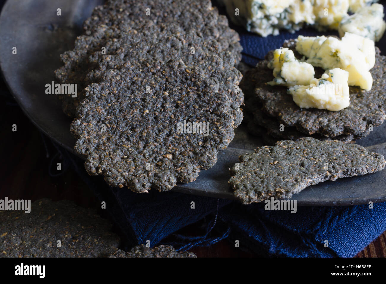 Charcoal biscuits with mature English Stilton cheese Stock Photo Alamy