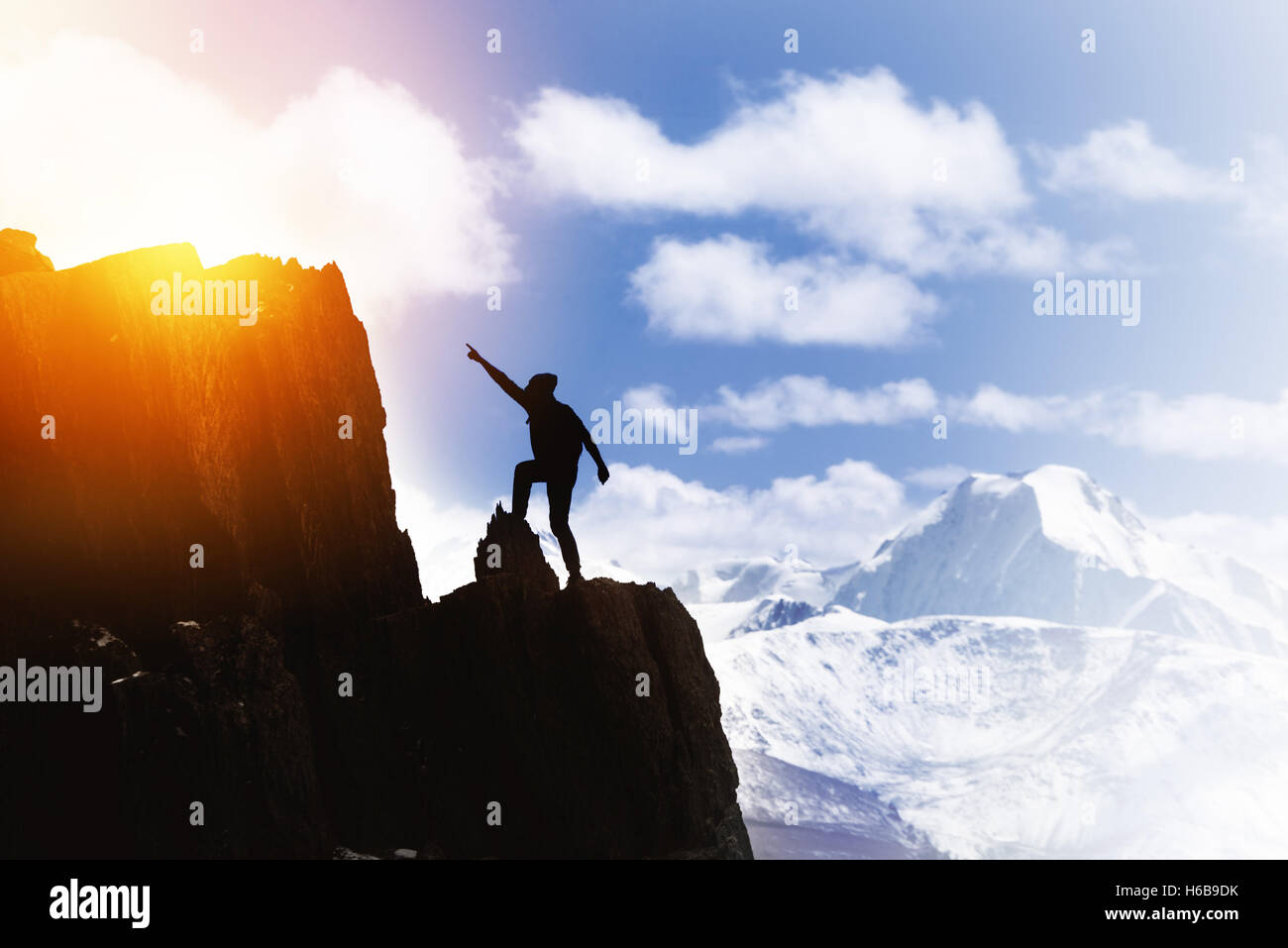 Man win aspiration ambition top mountain concept Stock Photo