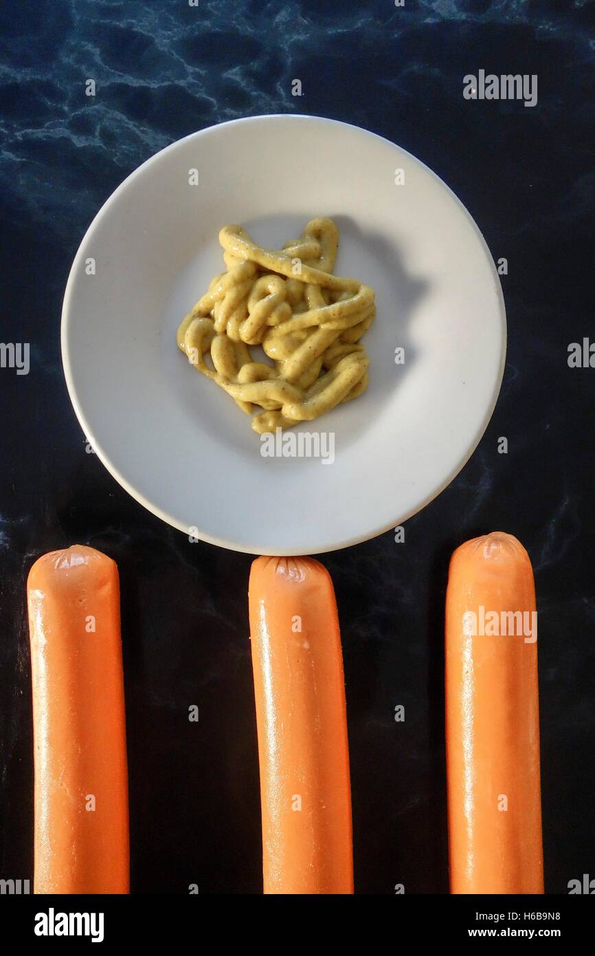 Three Frankfurter Sausages with Mustard Stock Photo Alamy