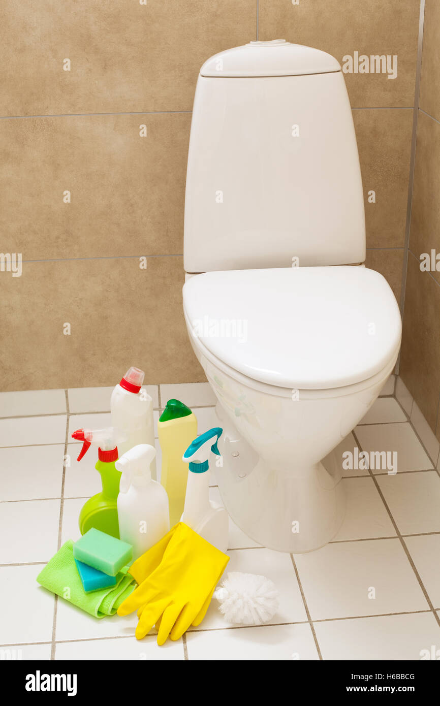 cleaning items gloves brush white toilet bowl bathroom Stock Photo - Alamy
