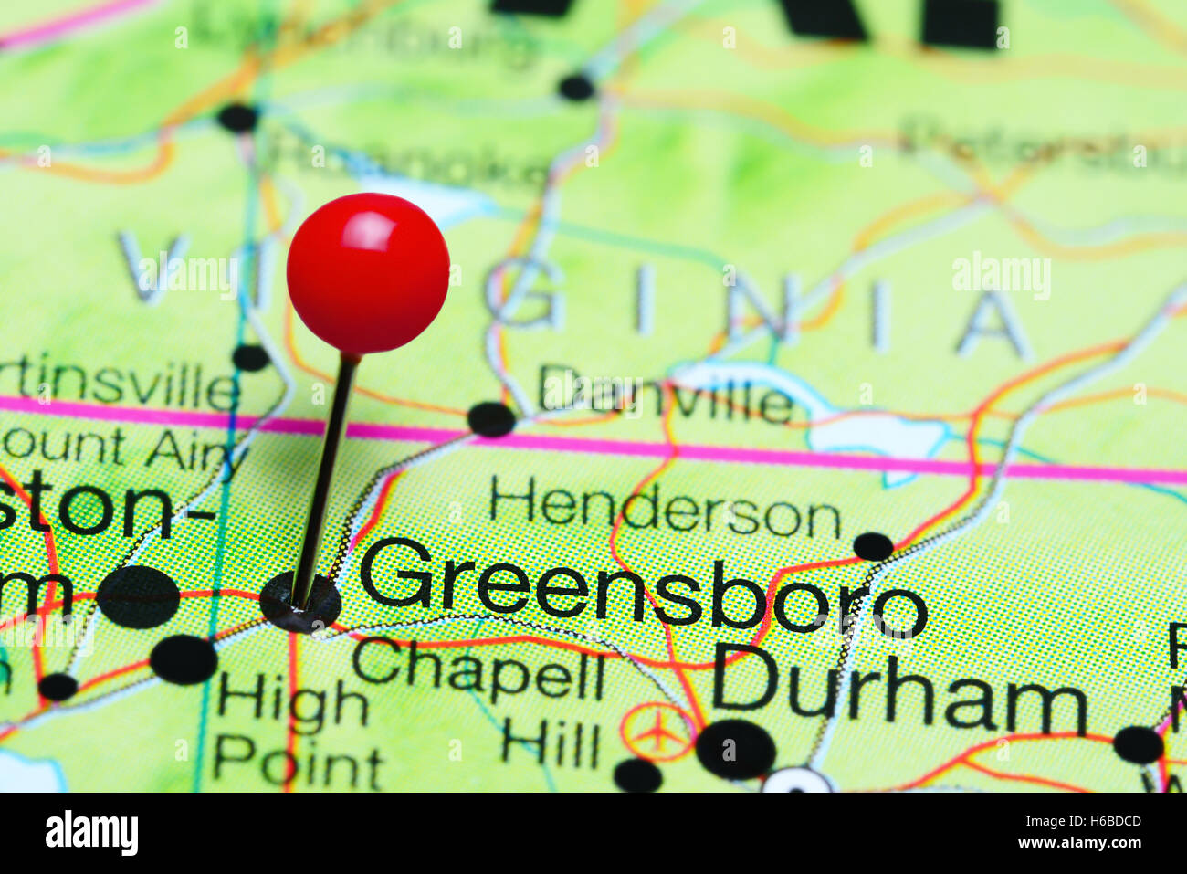 Greensboro pinned on a map of North Carolina, USA Stock Photo