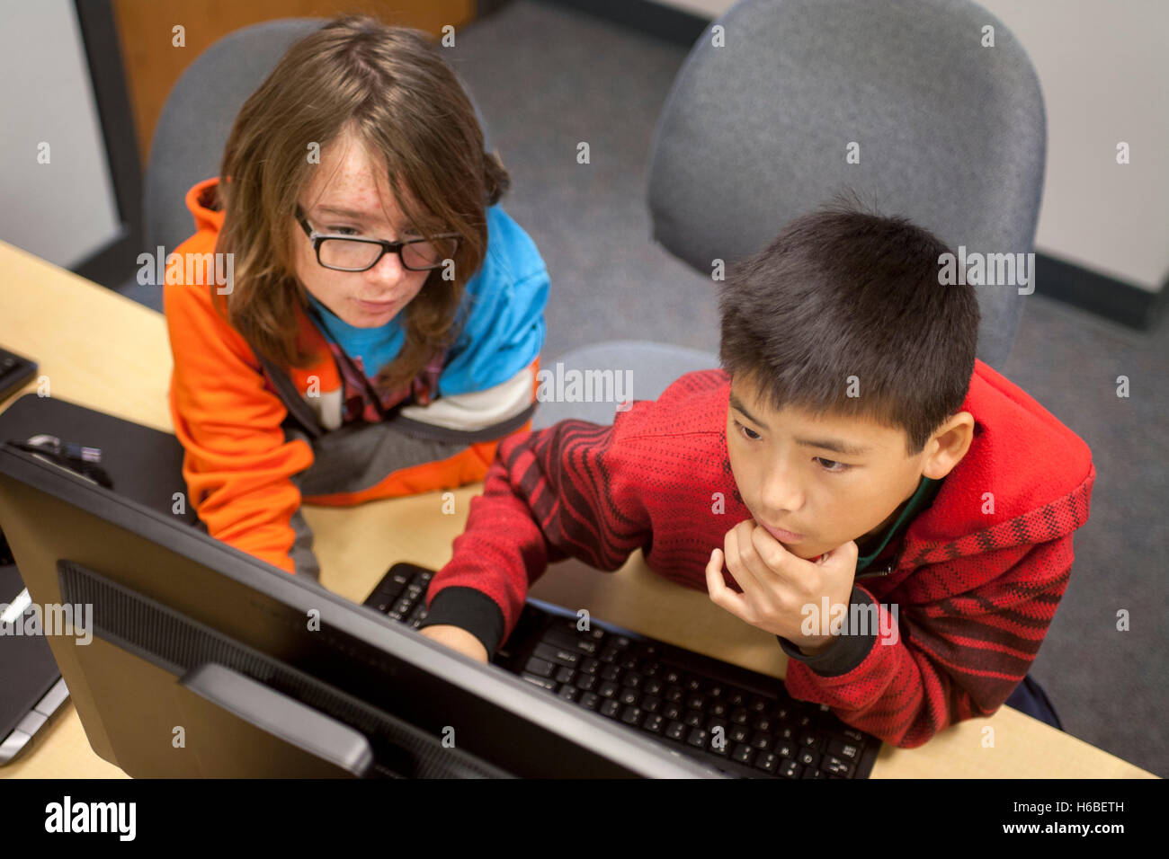 Enthusiastic Multiracial Teen Boys Compete In The Cyberpatriot