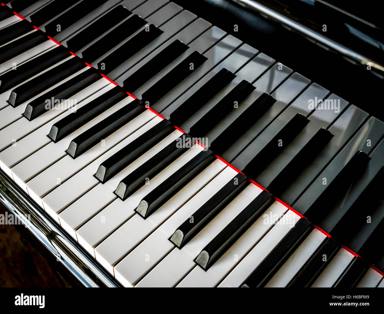 Closeup of a Piano keyboard with reflection Stock Photo - Alamy