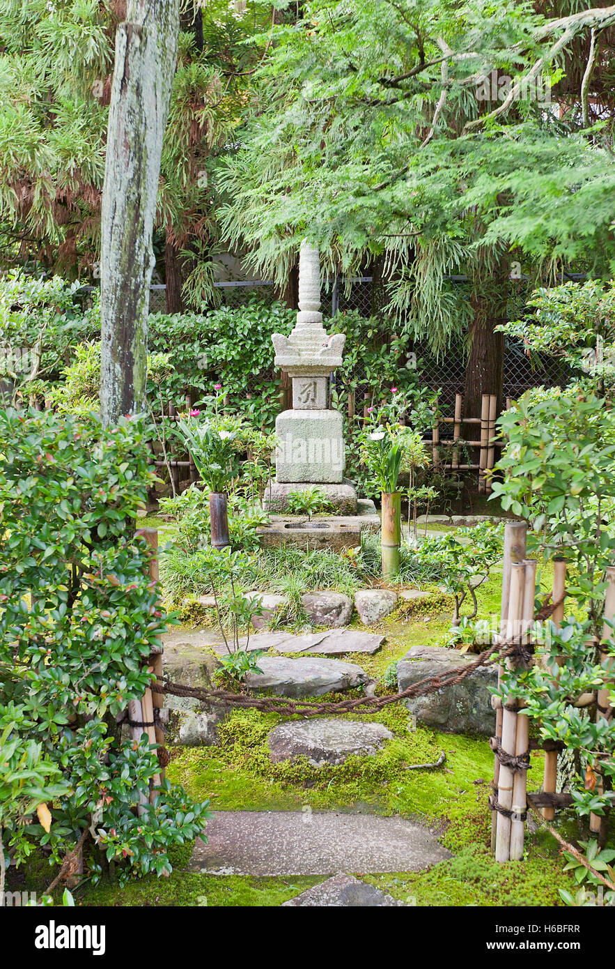 Grave of samurai Minamoto Yorimasa on grounds of Byodo-in Temple in Uji city near Kyoto, Japan Stock Photo