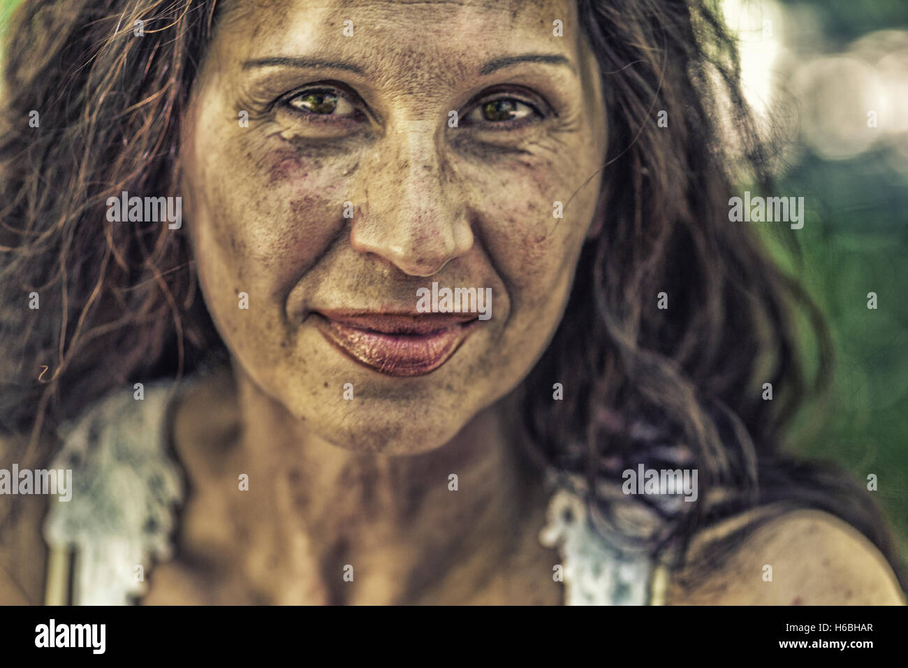 dirt stained and scarred skin of old woman Stock Photo