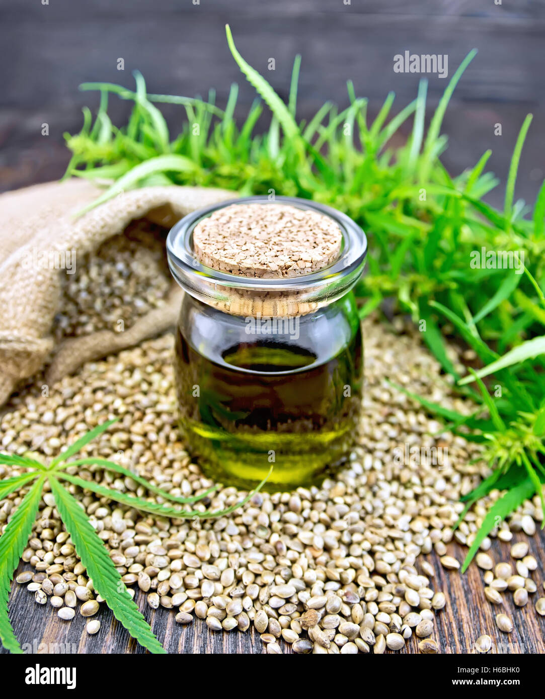 Oil hemp with seed on board Stock Photo Alamy