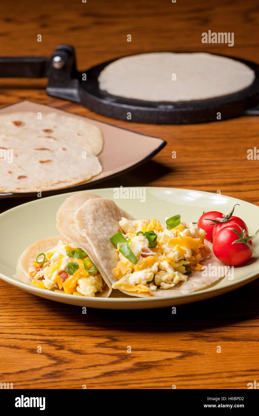 Plate of delicious breakfast burritos Stock Photo - Alamy