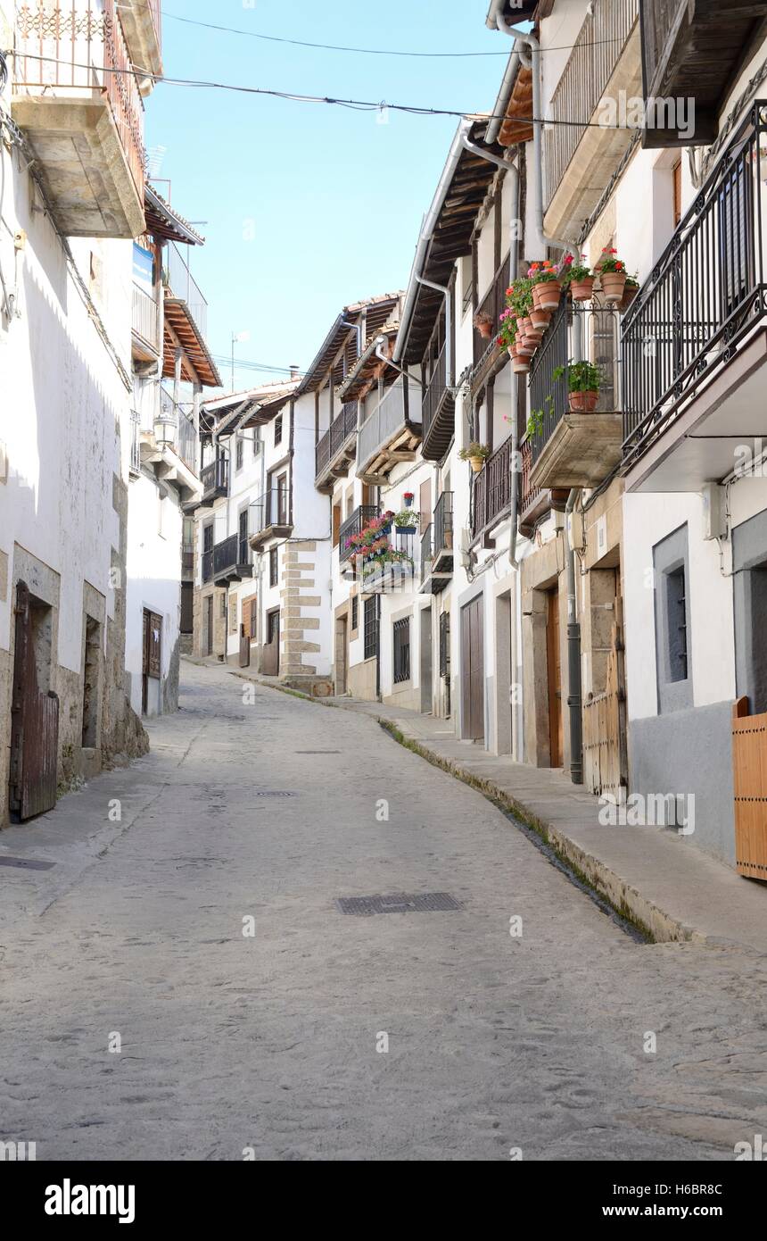 Steep street in the  picturesque village  of Candelario, in the province of Salamanca, Spain. Stock Photo