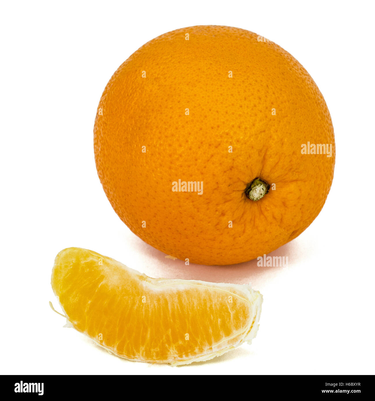 Orange With Ripe Slice of ripe orange, isolated on white background Stock Photo - Alamy
