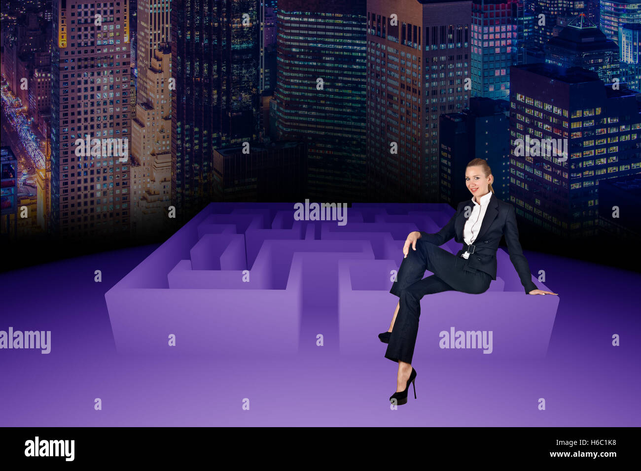 Woman in business concept with maze Stock Photo - Alamy