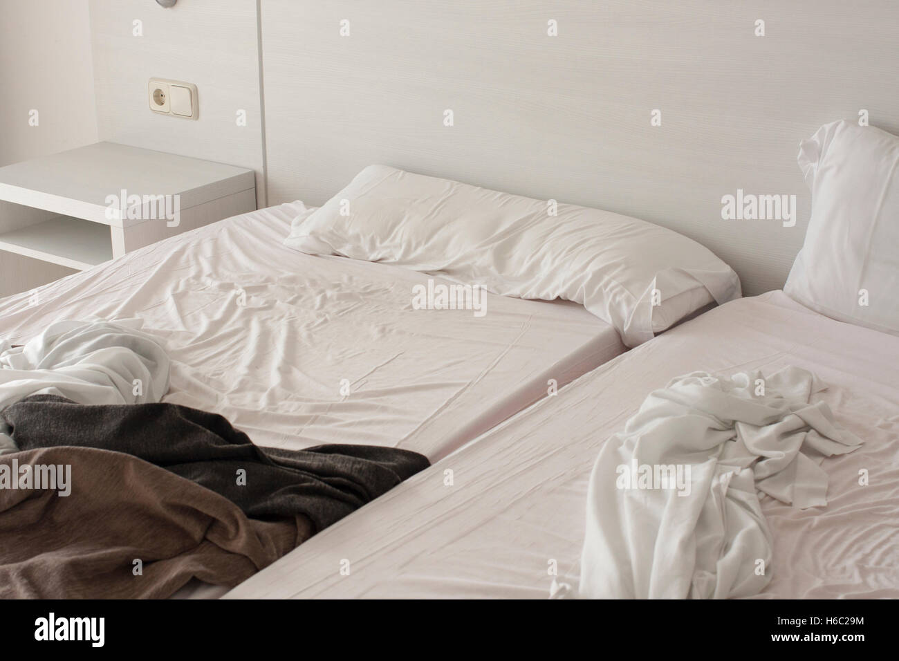 Unmade Hotel Beds Stock Photo