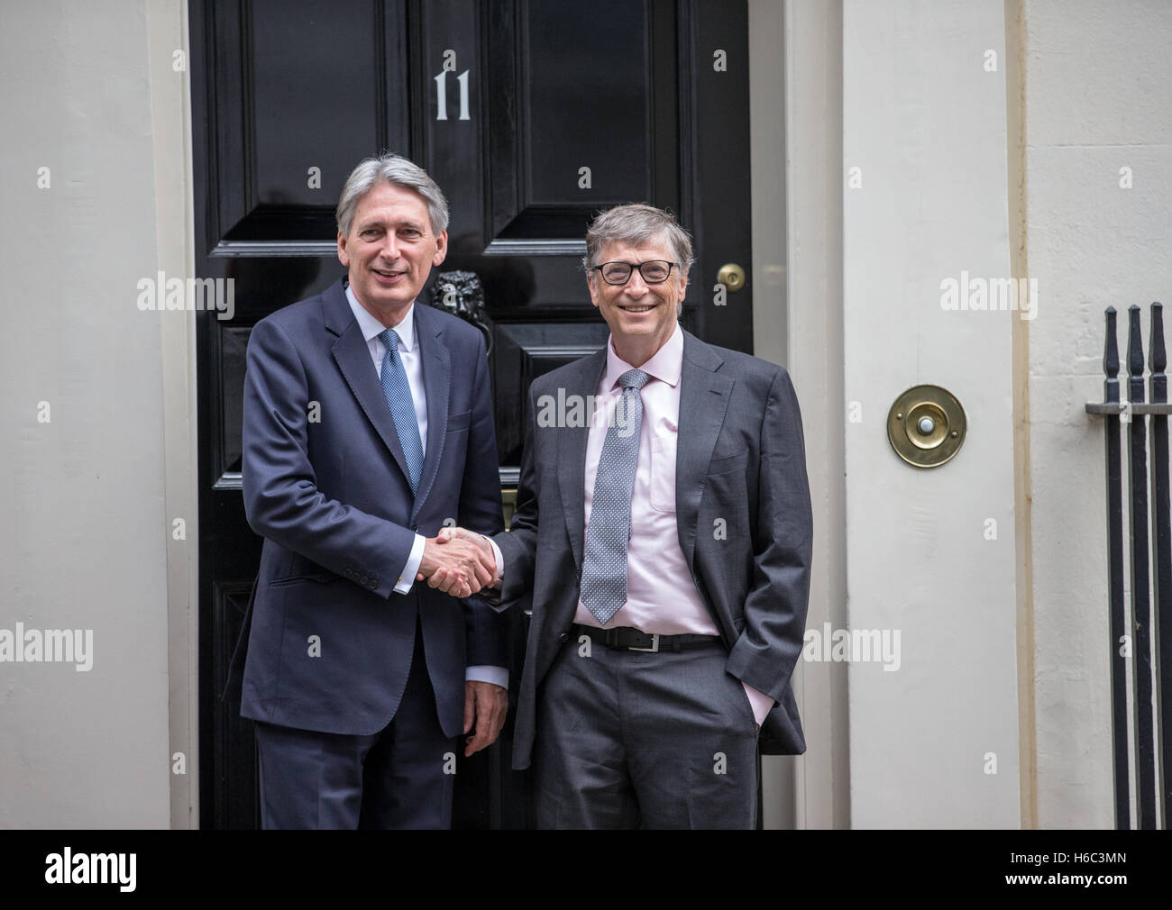Chancellor of the Exchequer,Phillip Hammond and Billionaire,Bill Gates,shake hands on the step of 11 Downing Street,London Stock Photo