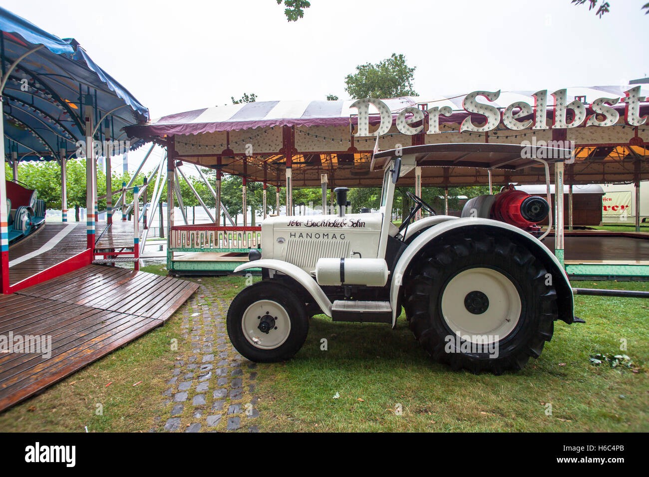 Europe, Germany, Duesseldorf, old Hanomag tractor on a fun fair near the state parliament. Stock Photo