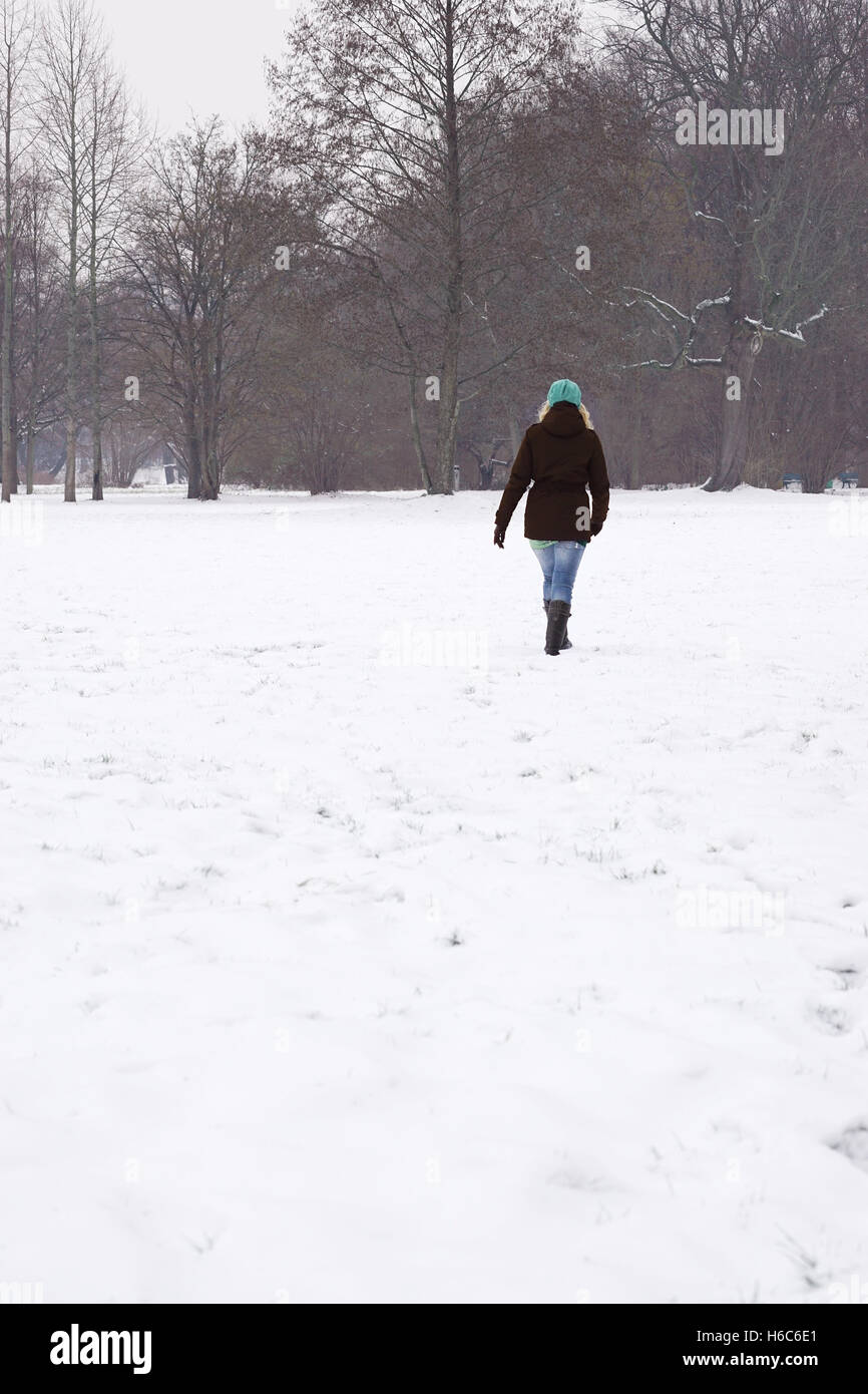 Woman snow rear view hi-res stock photography and images - Alamy