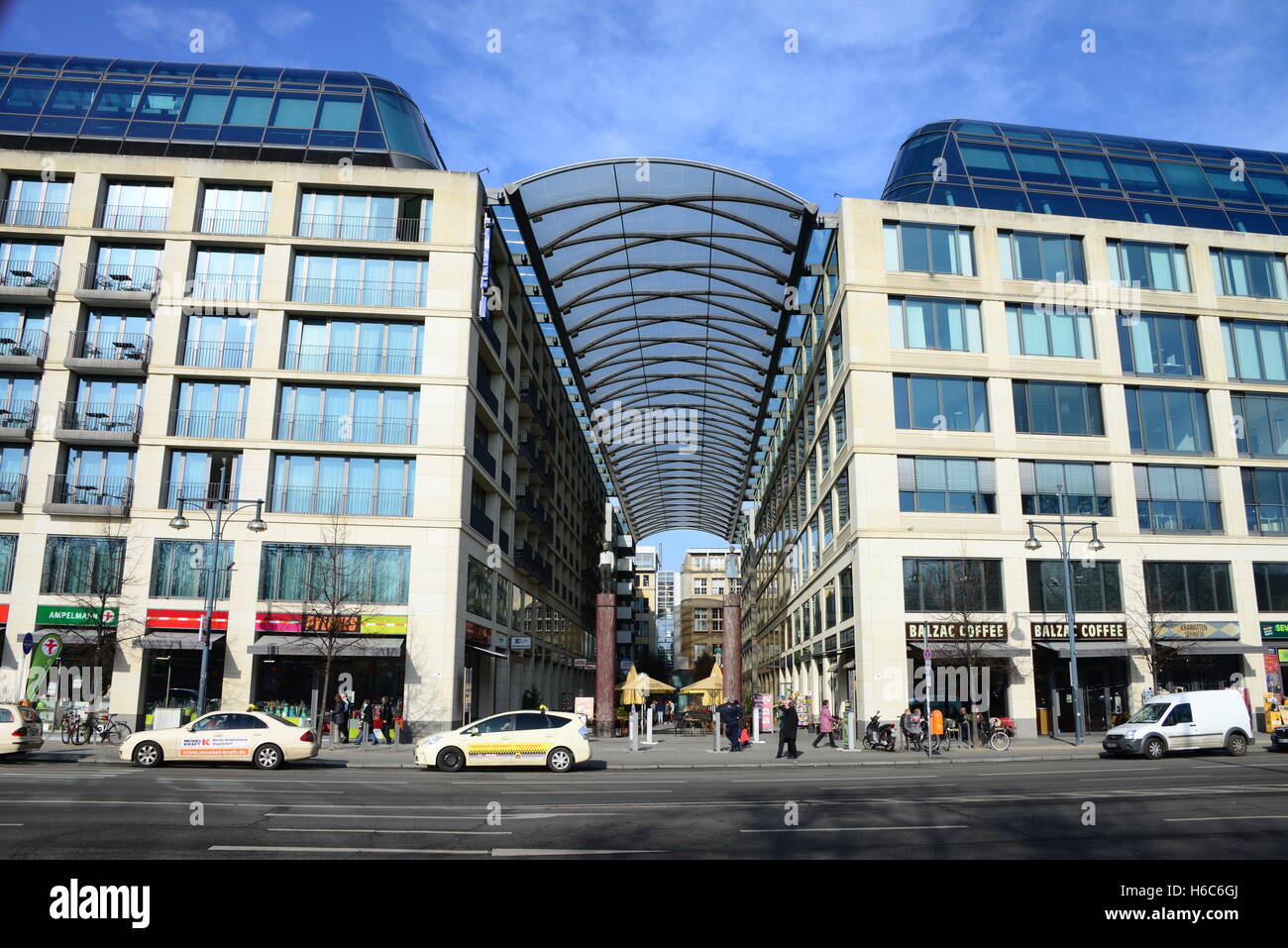 Modern shops and offices on Karl-Liebknecht Strasse, in the former East Berlin Stock Photo