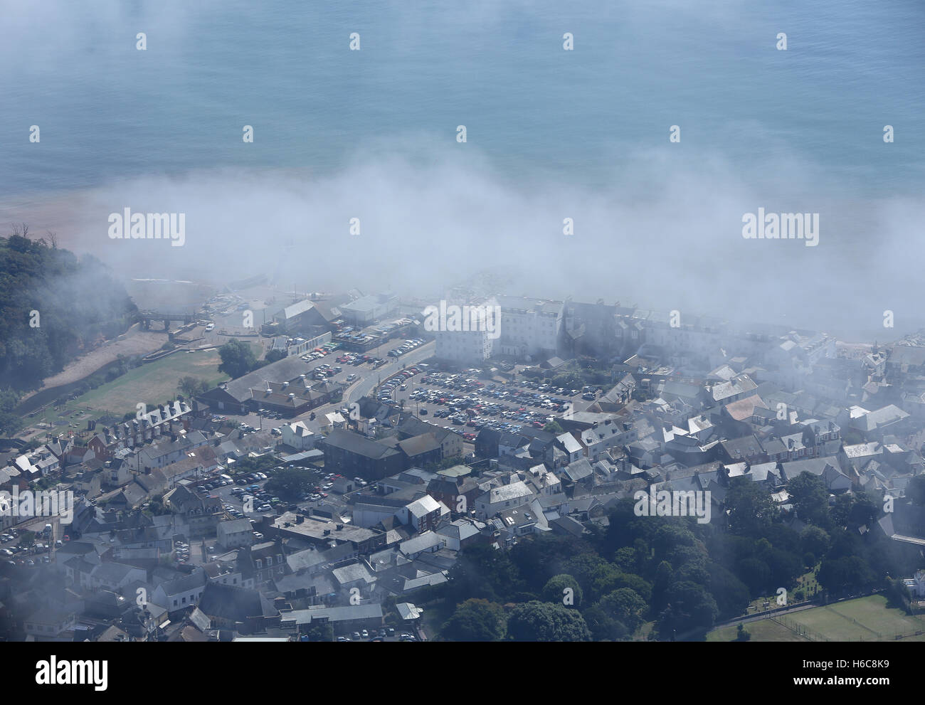 Aerial views of the Devon coast town of Sidmouth as the morning mist starts to clear. Stock Photo
