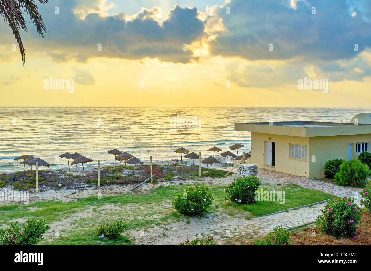 The colorful sunrise over the Mediterranean sea in resort of El Kantaoui, Tunisia. Stock Photo