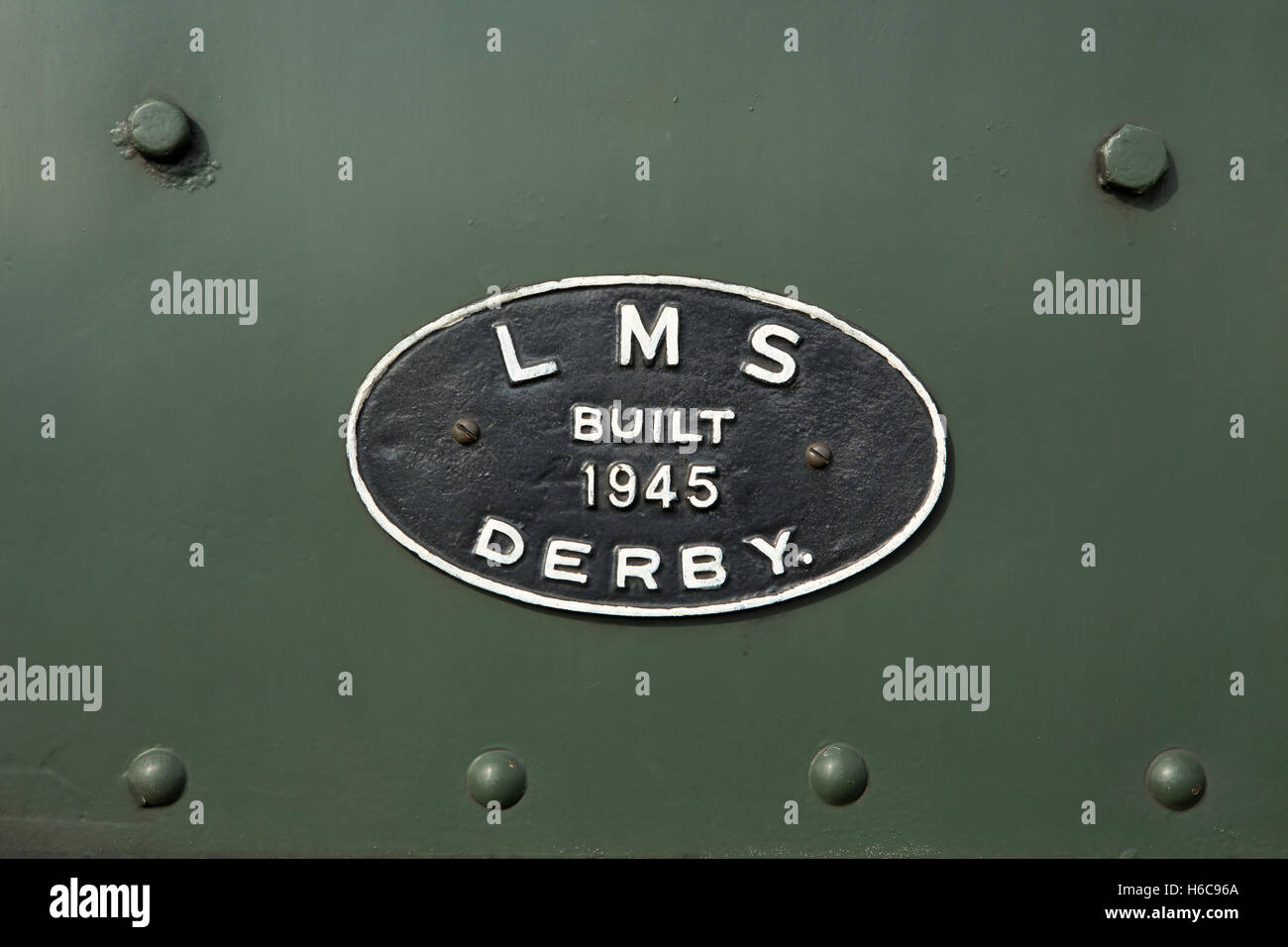LMS Steam Engine plaque engraved with built 1945 DERBY. Green London Midland Scotland train. Stock Photo
