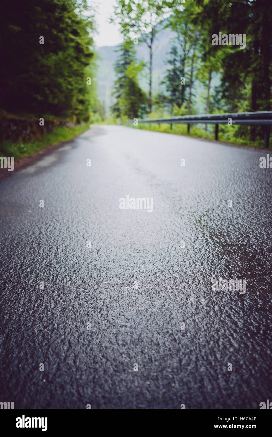 asphalt road in mountain in summer time Stock Photo