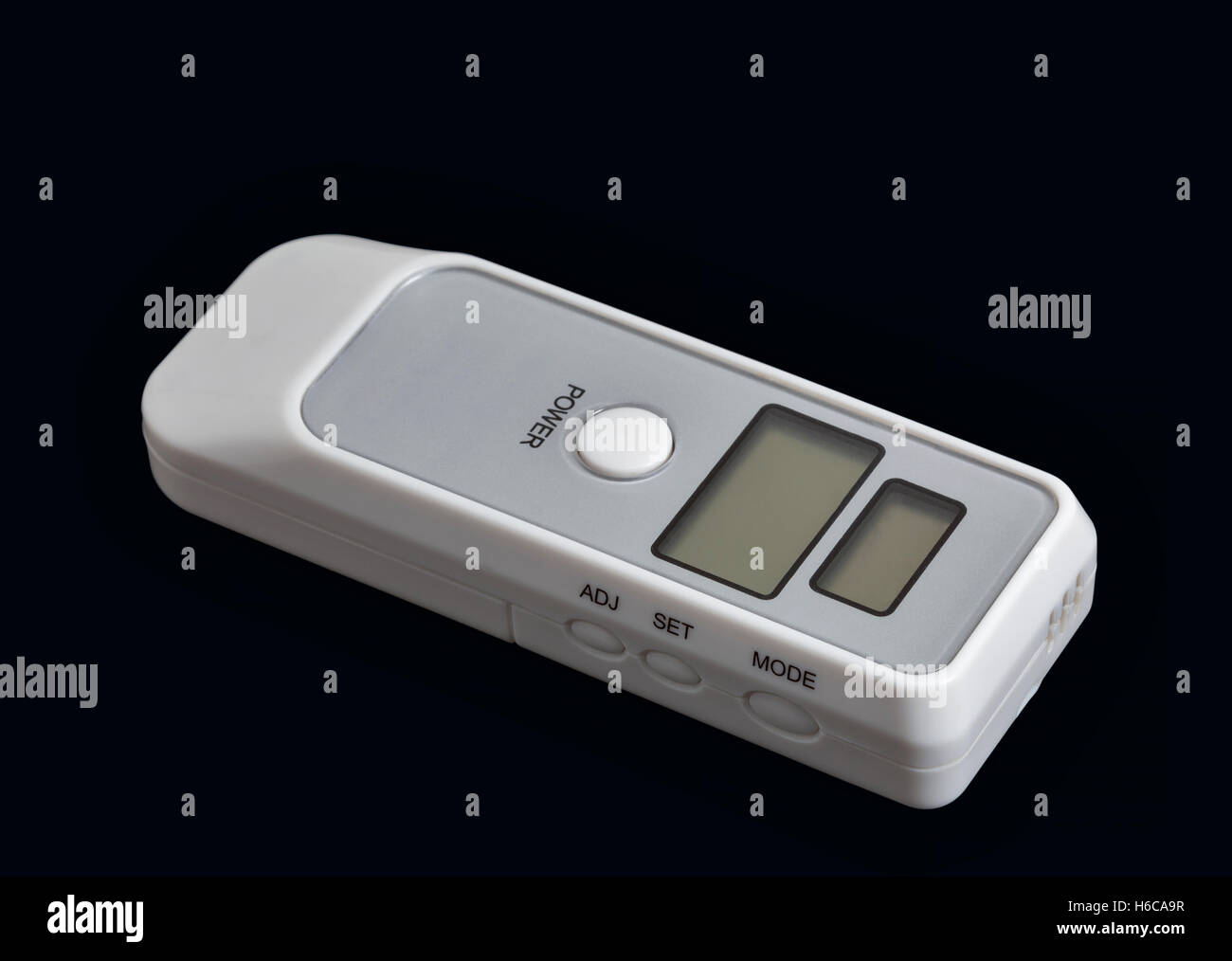 portable breath alcohol tester isolated on black background closeup Stock Photo
