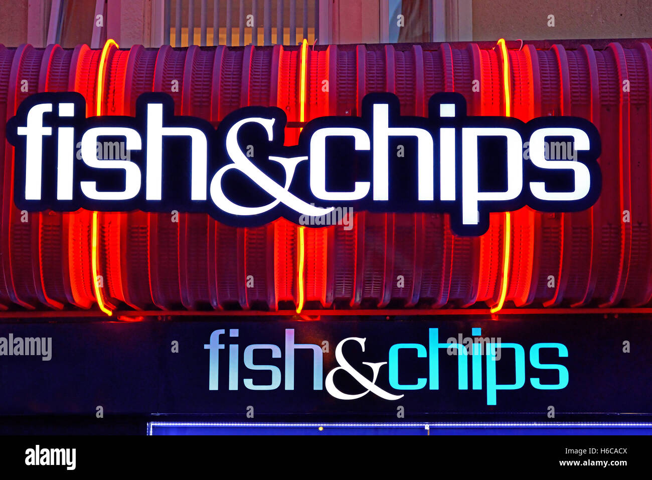 Fish and chips neon sign Whitley Bay Stock Photo