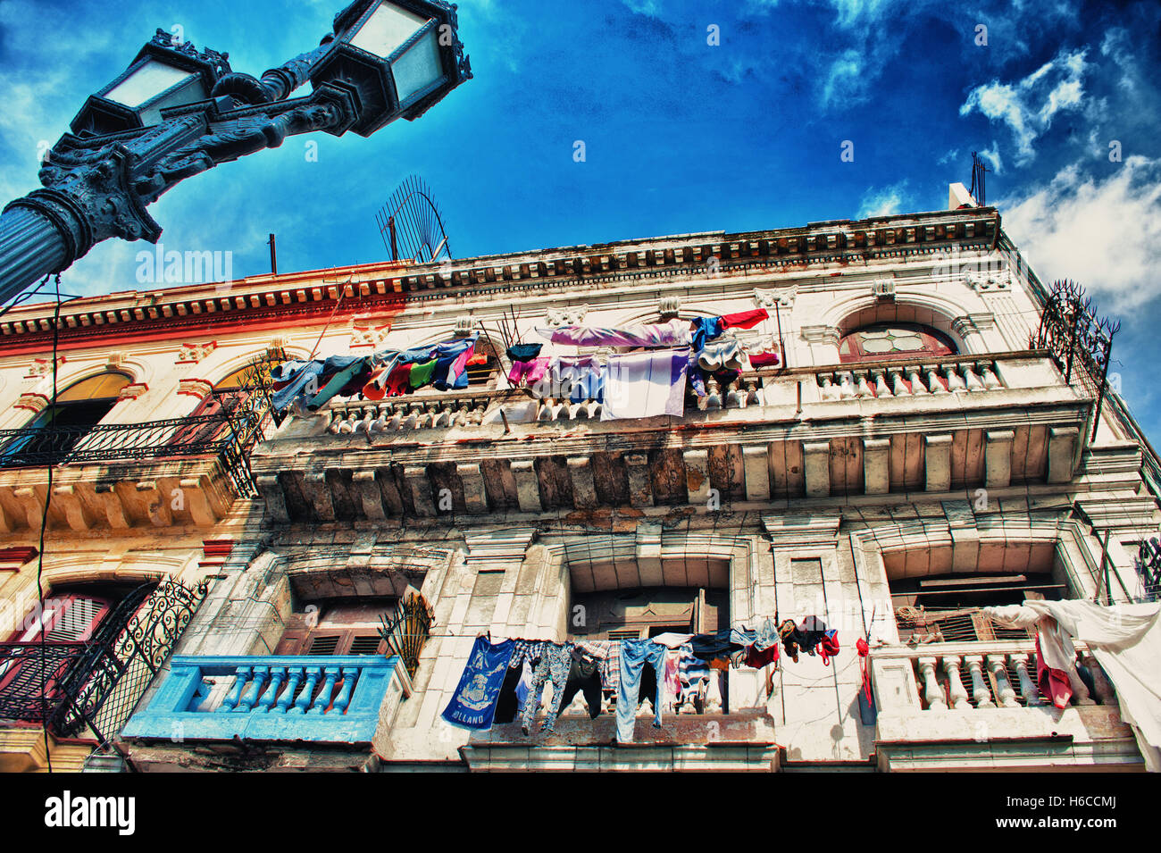 View of Havana building facade with clothes lines in the balconies