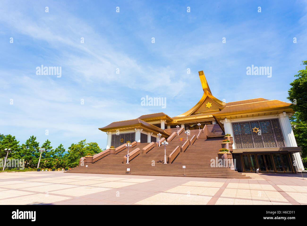 Angled front entrance, steps and facade of World Shrine headquarters