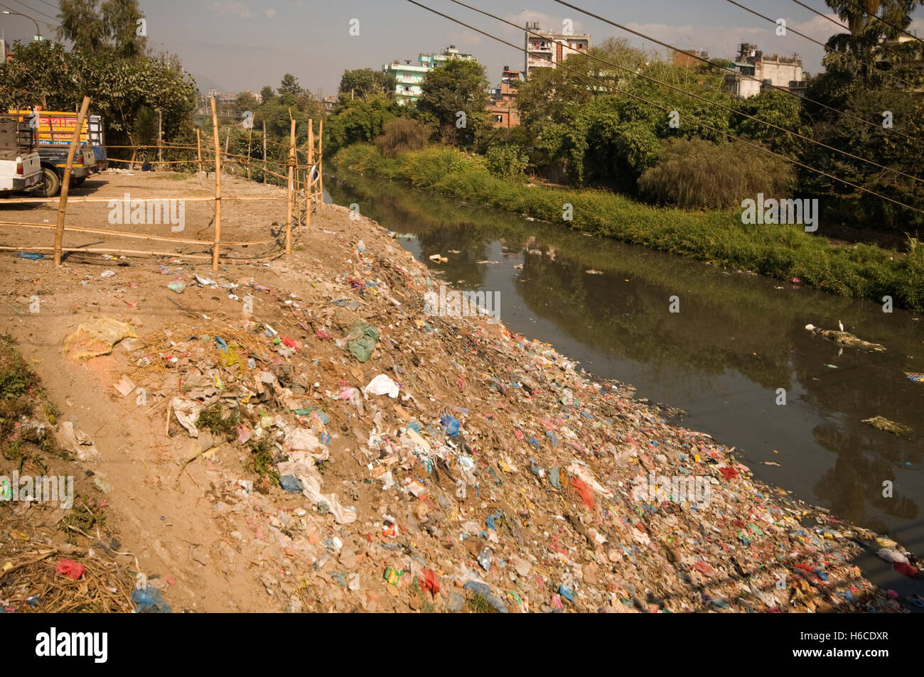 NEPAL, Kathmandu, side of river used as rubbish tip Stock Photo