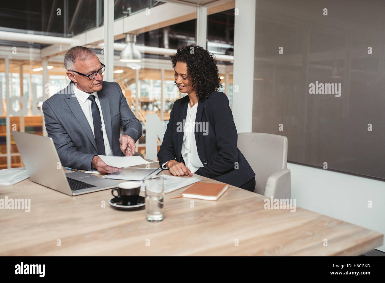 Explaining the finer points of business Stock Photo