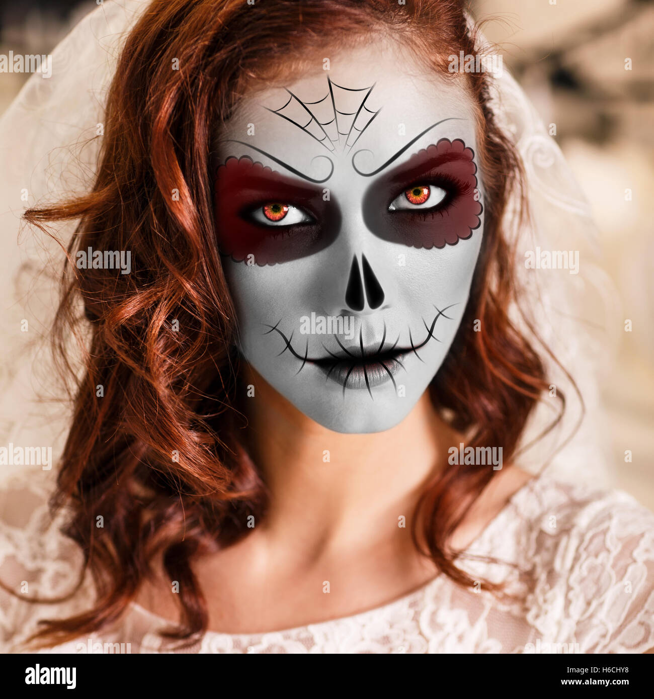 Young woman in day of the dead mask Stock Photo