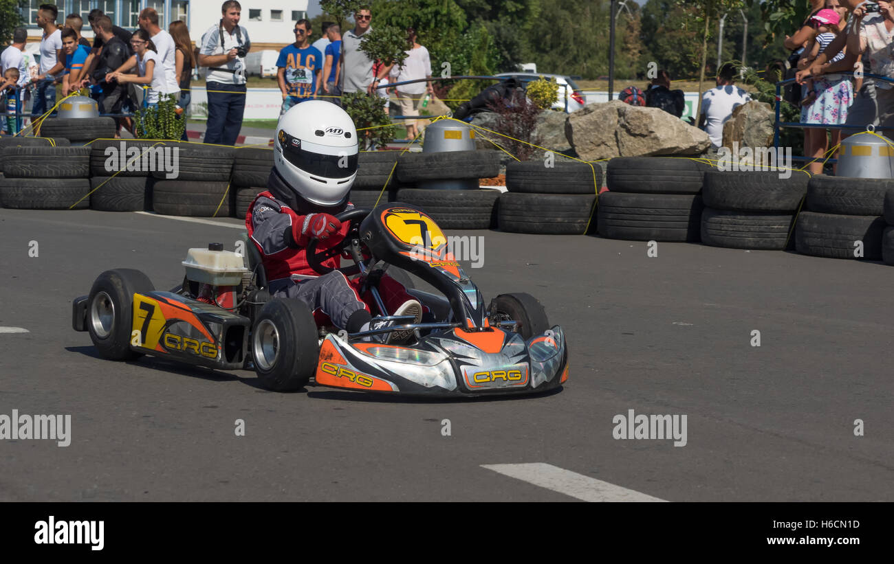 GALATI, ROMANIA - September 11, 2016: Boy drive karting car on a track to demonstrate the spectators the speed Stock Photo